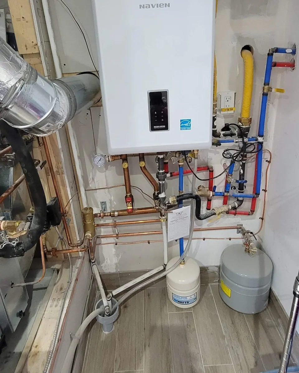 Wall-hung boiler installed with copper and gas piping